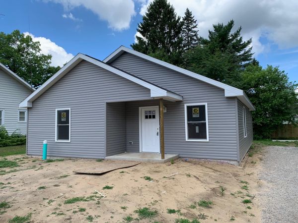 Homeowners Move into Habitat for Humanity Homes - OCP Contractors